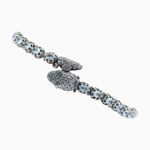 Schlangenarmband aus Roségold und Silber mit Diamanten, Topas und Tsavorit