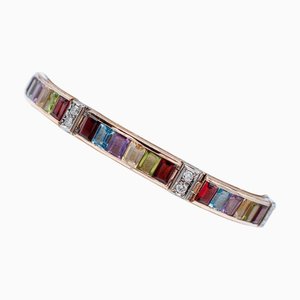 Armband aus Rosé- und Weißgold mit Granaten und Peridot