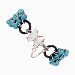 Armband aus Roségold und Silber mit Türkis, Rubinen, Steinen und Onyx
