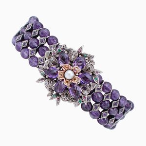 Armband aus Gold und Silber mit Diamanten und Smaragden