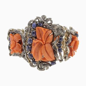 Armband aus Gold und Silber mit Diamanten und blauen Saphiren und großen Korallen