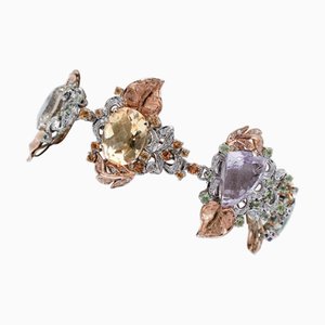Armband aus Rosé- und Weißgold mit Amethysten, Topasen, grünem Amethyst und Peridot