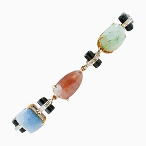 Armband aus Rosé- und Weißgold mit farbigen Saphiren und Diamanten
