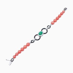 Platinum and White Gold Bracelet with Coral and Emerald