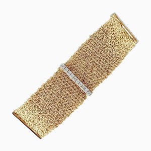 Armband aus 18 Karat Weiß- und Gelbgold mit Diamanten