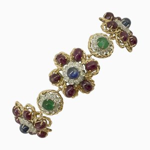 Gliederarmband aus Rosé- und Weißgold mit weißen Diamanten und Rubinen