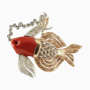 Halskette mit Anhänger in Fischform mit Diamanten und blauen Saphiren