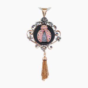 Halskette mit Anhänger aus Gold und Silber mit Onyx, Rubinen, Saphiren und Diamanten