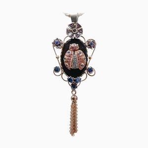 Brosche oder Anhänger aus Roségold und Silber mit Saphiren, Rubinen, Diamanten und Onyx