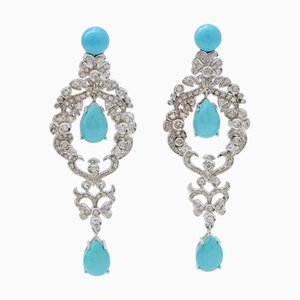 Pendientes de oro blanco con turquesas y diamantes. Juego de 2