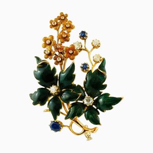 Brosche mit Saphiren, Diamanten, Gelbgold und Emaille