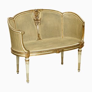 French Louis XVI Carved Giltwood Double Caned Bergere Sofa