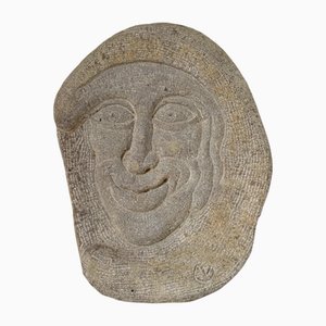 Gesicht aus Steinskulpturen, 1950