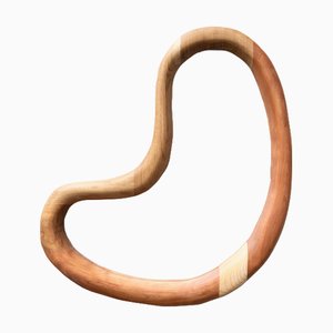 Espejo de pared Game of the Nose de madera maciza de Marco Calhau