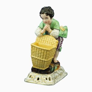Early 19th Century Porcelain Figurine of Child with Basket by Jacob Petit, France