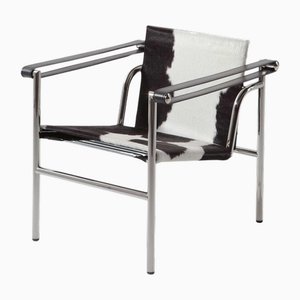 1 Armlehnstuhl mit neigbarer Rückenlehne von Le Corbusier für Cassina