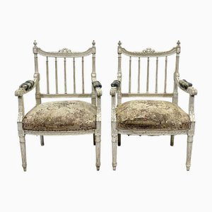 Suite de Fauteuils Louis XVI en Hêtre