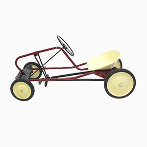 Coche de pedal infantil rojo, años 50