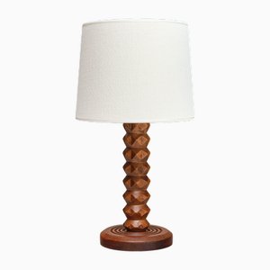 Lámpara de mesa de roble con pantalla marfil atribuida a Charles Dudouyt, Francia, años 50