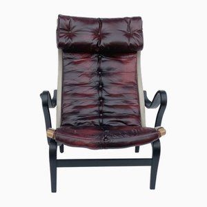 Silla Bolt 69 vintage de cuero sangre de Bruno Mathsson para Dux, años 60