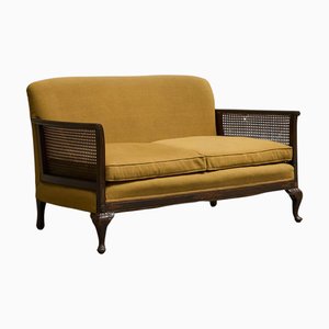 Antique Bergère Style Sofa in Wood, Cane and Ochre Yellow Upholstery, 1930s