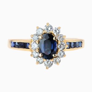 Anillo moderno de zafiro y diamantes en oro amarillo de 18 kt