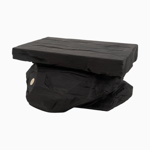 Mesa auxiliar rústica y escultural de Logniture