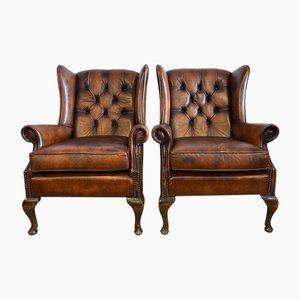 Set of English Leather Wingback Armchairs