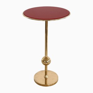 Mesa auxiliar italiana vintage de latón y vidrio rojo de Osvaldo Borsani para Tecno, años 50