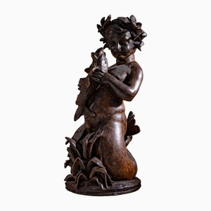 Skulptur eines Putten als Wassermann, Frühes 20. Jh., Gusseisen
