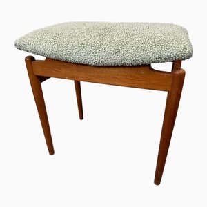 Otomana vintage de madera y tela