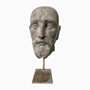 Testa di scultura in terracotta