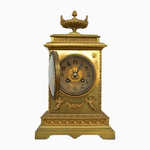 Orologio da tavolo in bronzo e ottone, XIX secolo
