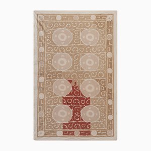 Bestickter usbekischer Wandbehang in Kamelrot und Rosa