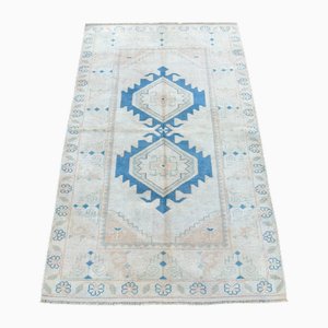 Tapis turc en laine vieillie