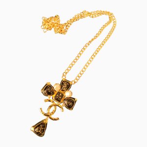 Colgante de collar Chanel en negro y dorado de Chanel