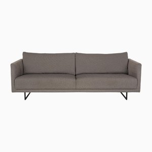Sofá Freistil de tres plazas de tela gris de Rolf Benz