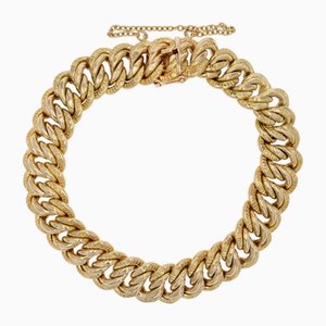 Brazalete estadounidense de malla cincelada en oro amarillo de 18 kt, años 50