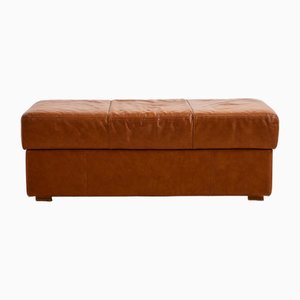 Pouf con rivestimento in pelle