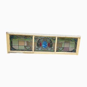 Ventana antigua de vidrio emplomado, década de 1890
