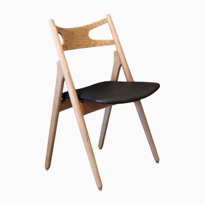 Chair Model CH29 in Oak with Seat in Black Leather by Hans J. Wegner for Carl Hansen & Søn, 1950s
