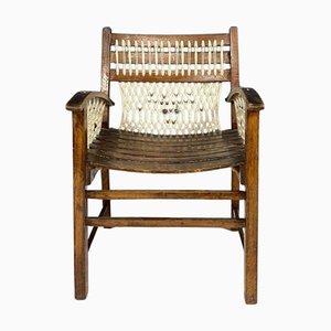 Butaca vintage de macramé con estructura de madera, Checoslovaquia, años 60