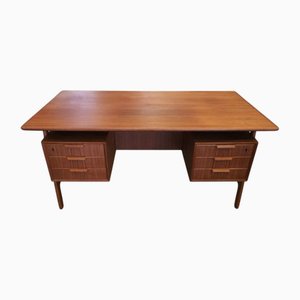 Escritorio modelo 75 de teca de Gunni Omann para Omann Jun Møbelfabrik, Dinamarca, años 60