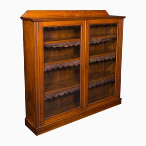 Libreria antica smaltata in quercia, 1880