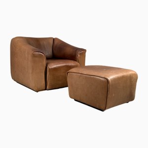 Poltrona DS 47 e poggiapiedi in pelle di bufalo di de Sede, Svizzera, anni '70, set di 2