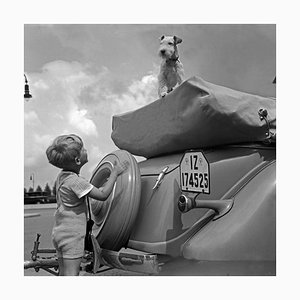Heinz Pollmann, Ford Cabrio Tour with Little Boy and Dog, 1936 / 2025, Photograph