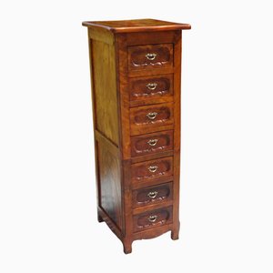 Unidad columna de almacenamiento alta y estrecha con 7 cajones de caoba flameada, década de 1890