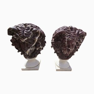 Sculptures Representing the Head of Medusa, 1980, Marble, Set of 2