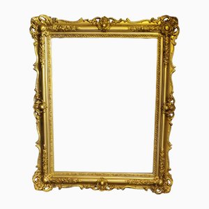 Cornice antica in legno dorato