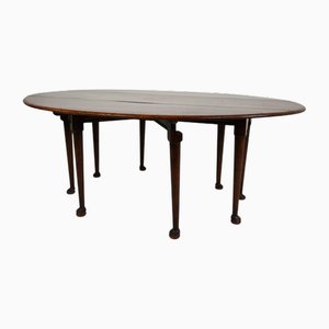 Mesa de comedor inglesa victoriana antigua oval de hojas abatibles